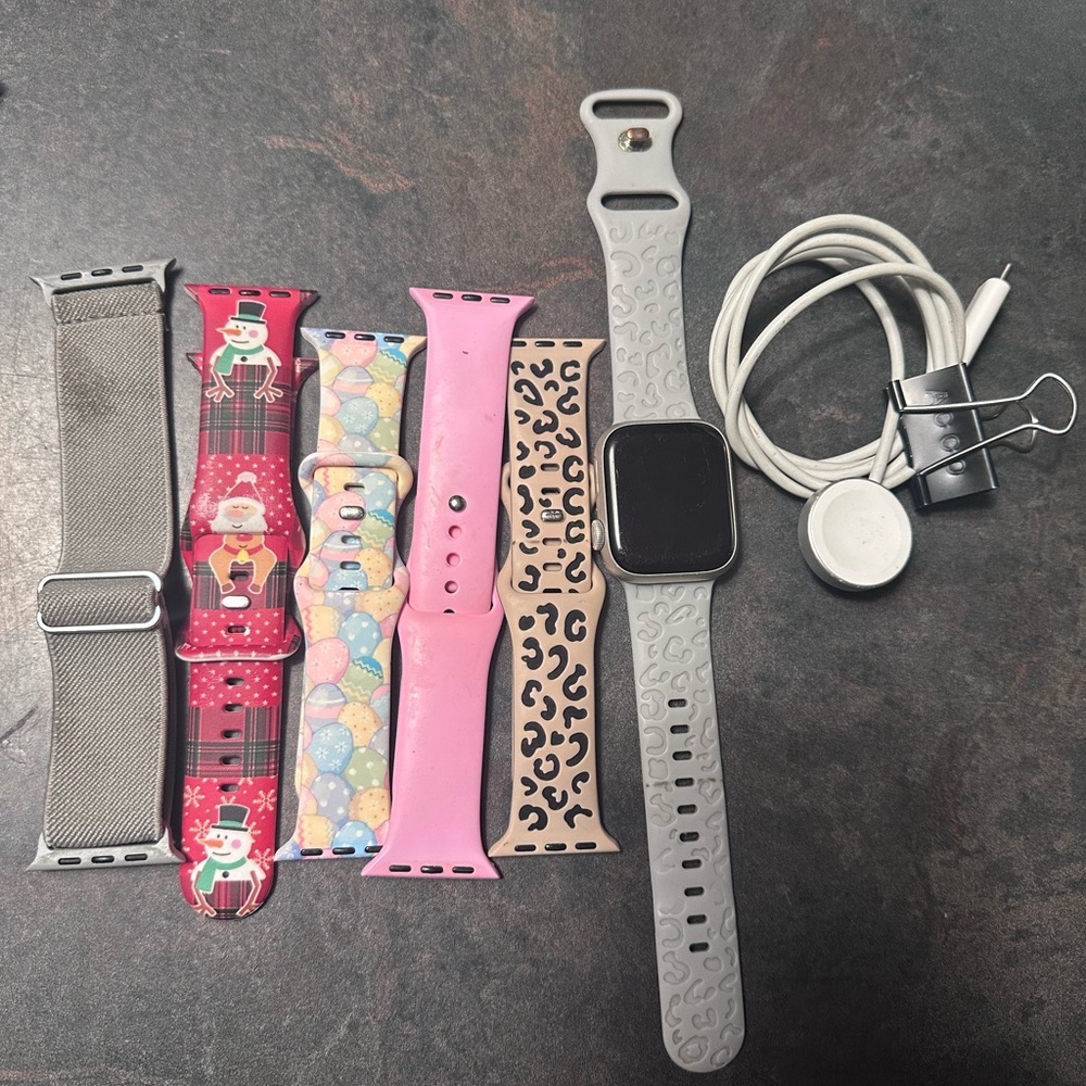 Apple Watch with Gray, Red, Pink, and Leopard Bands well loved Apple Watch 7